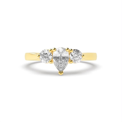 Prong Pear Yellow Gold With round on side Trilogy Engagement Rings