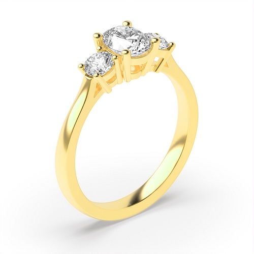 4 Prong Oval Yellow Gold Separate claws graduating Trilogy Engagement Rings