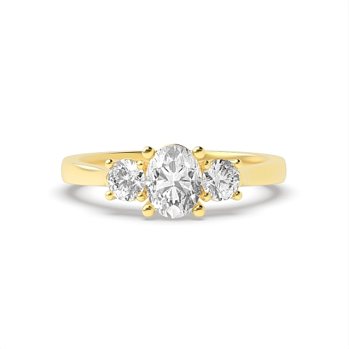 4 Prong Oval Yellow Gold Separate claws graduating Trilogy Engagement Rings