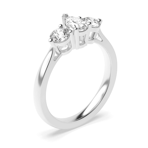 Prong Pear And round graduated Engagement Rings