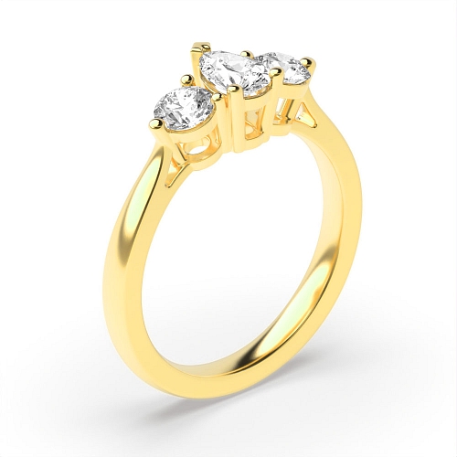Prong Pear Yellow Gold And round graduated Engagement Rings