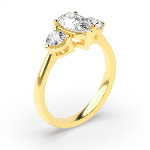 Prong Pear Yellow Gold And round basket Engagement Rings