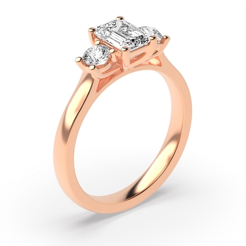 4 Prong Emerald Rose Gold And round graduated Trilogy Engagement Rings