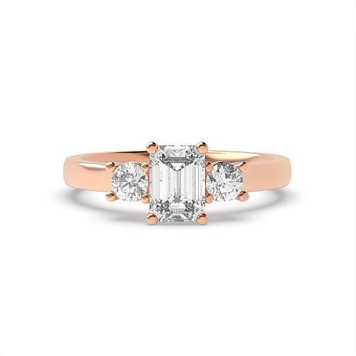 4 Prong Emerald Rose Gold And round graduated Trilogy Engagement Rings