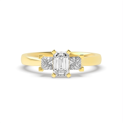 4 Prong Emerald Yellow Gold With princess on side Engagement Rings