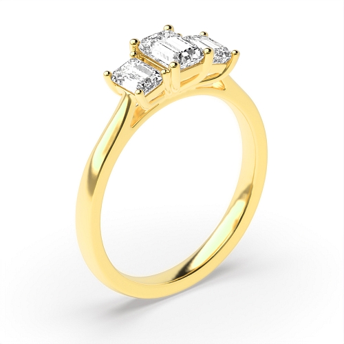Emerald Yellow Gold Raised setting graduating Engagement Rings