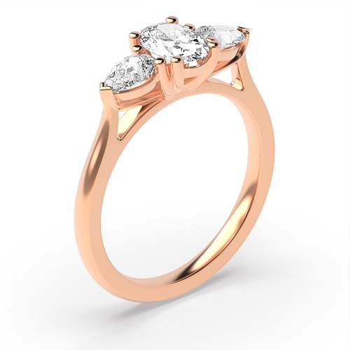 4 Prong Oval Rose Gold And pear shape Trilogy Engagement Rings
