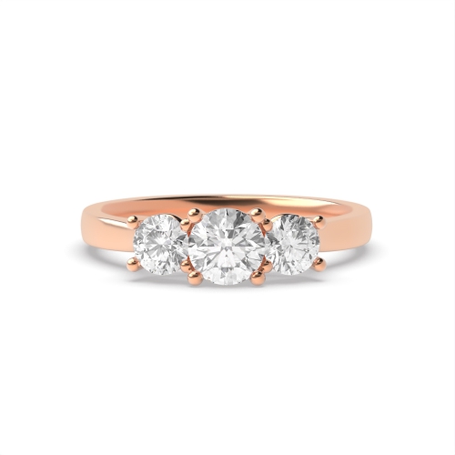 4 Prong Round Rose Gold Graduating raised set Trilogy Engagement Rings