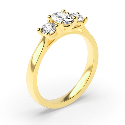 4 Prong Oval Yellow Gold And round separate claws Trilogy Engagement Rings