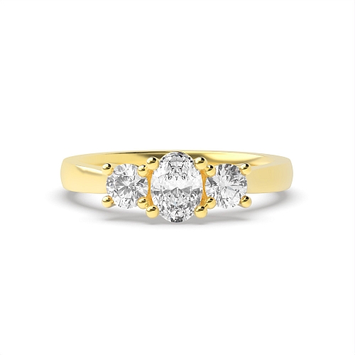 4 Prong Oval Yellow Gold And round separate claws Trilogy Engagement Rings