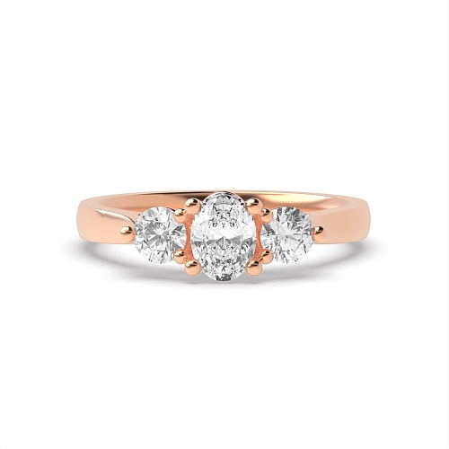 Oval Rose Gold And round raised setting Trilogy Engagement Rings