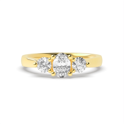 Oval Yellow Gold And round raised setting Engagement Rings