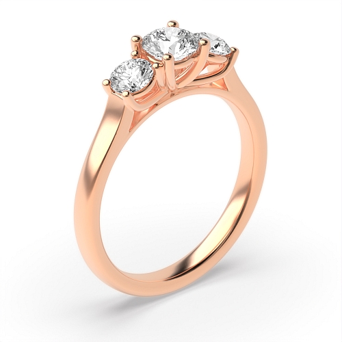 4 Prong Round Rose Gold Graduated separate claws Trilogy Engagement Rings