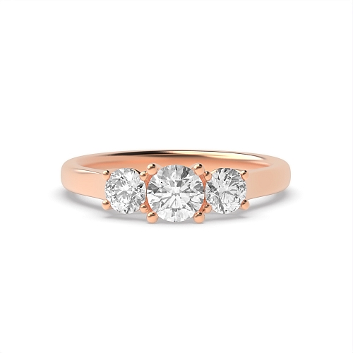 4 Prong Round Rose Gold Graduated separate claws Trilogy Engagement Rings