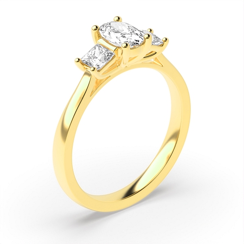4 Prong Oval Yellow Gold And princess on side Trilogy Engagement Rings