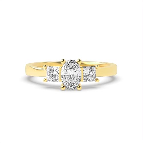 4 Prong Oval Yellow Gold And princess on side Trilogy Engagement Rings
