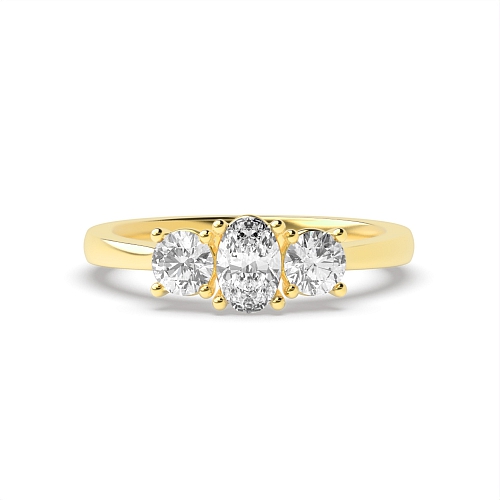 4 Prong Oval Yellow Gold With round Trilogy Engagement Rings