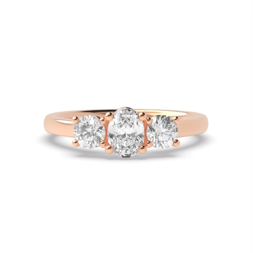 4 Prong Oval Rose Gold And round high set Trilogy Engagement Rings