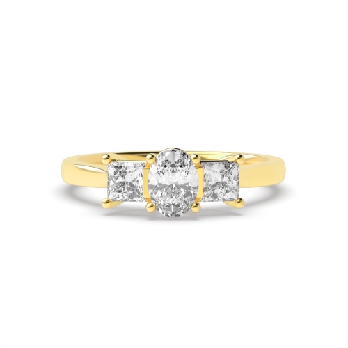 4 Prong Oval Yellow Gold And process tapering shoulder Trilogy Engagement Rings
