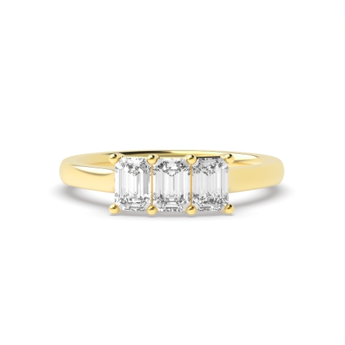 4 Prong Emerald Yellow Gold Raised set Trilogy Engagement Rings