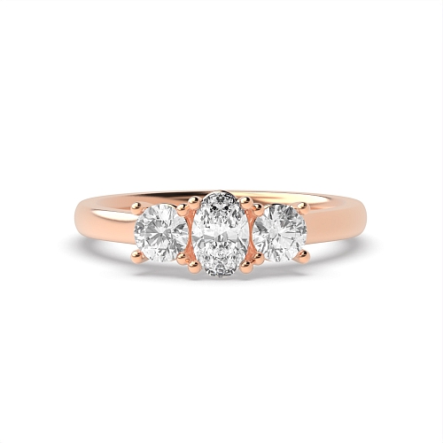 4 Prong Oval Rose Gold And Round raised set Trilogy Engagement Rings