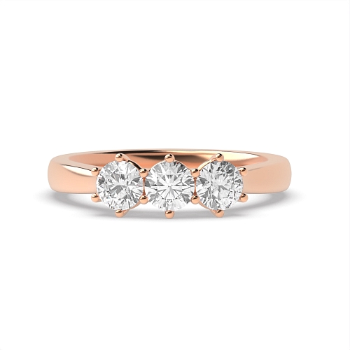 Round Rose Gold Basket setting Trilogy Engagement Rings