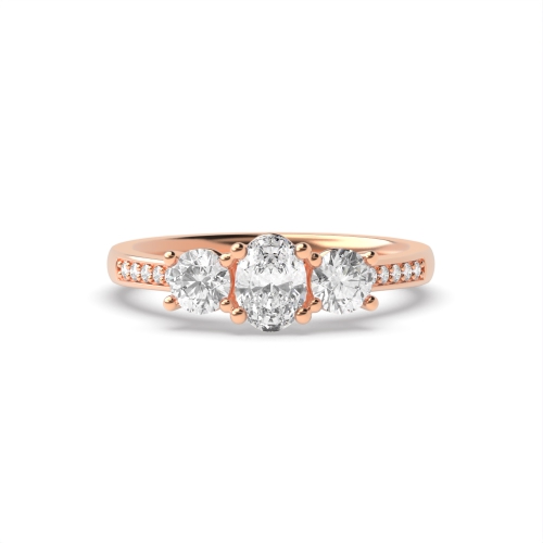 4 Prong Oval Rose Gold And round diamond on shoulder Trilogy Engagement Rings