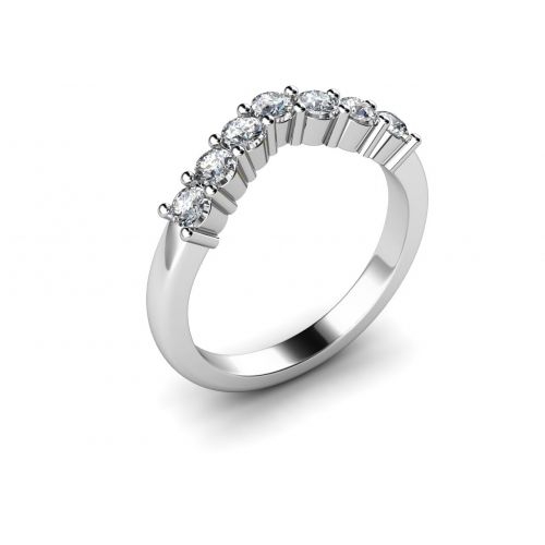 4 Prong Round stone shared prongs Seven Stone Diamond Rings