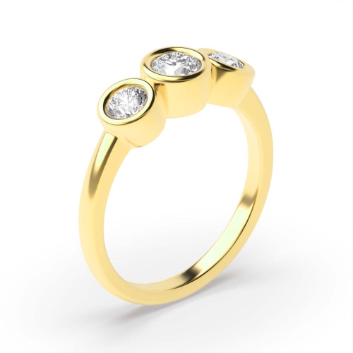 Bezel Setting Round Yellow Gold Graduated Trilogy Engagement Rings