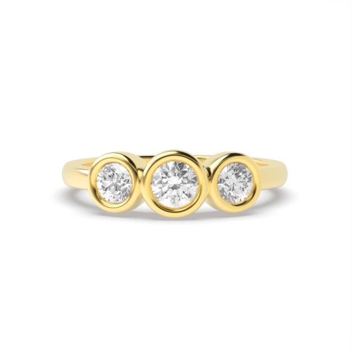 Bezel Setting Round Yellow Gold Graduated Trilogy Engagement Rings