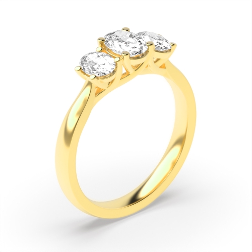 4 Prong Oval Yellow Gold Trilogy Diamond Rings