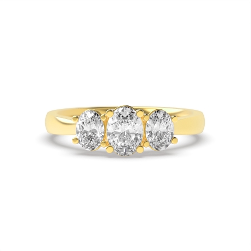 4 Prong Oval Yellow Gold Trilogy Diamond Rings