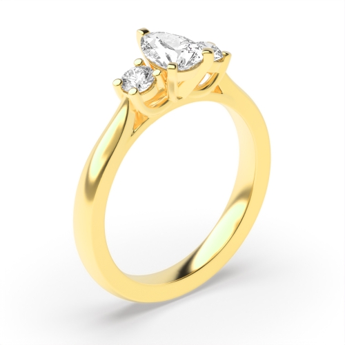 unique pear and round cut diamond trilogy engagement ring